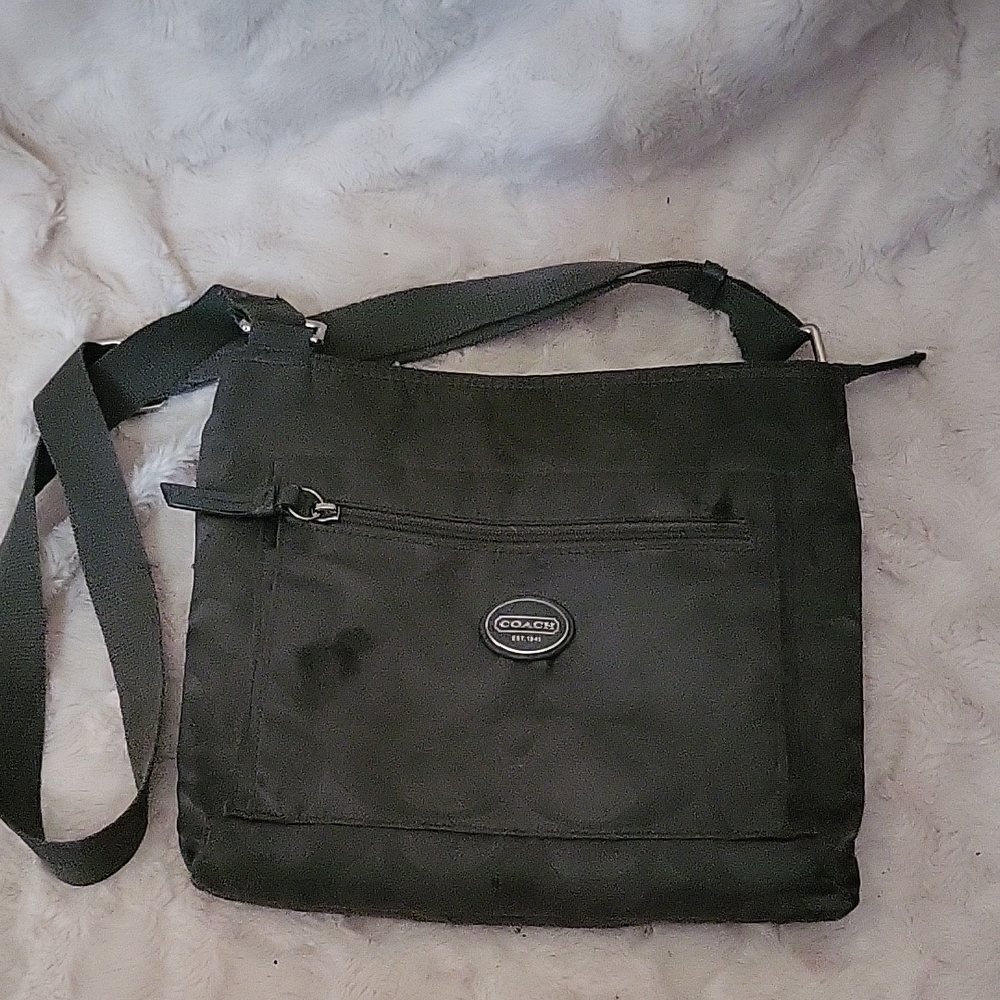 Coach Black Messenger Bag with Adjustable Strap and Utilitarian Design